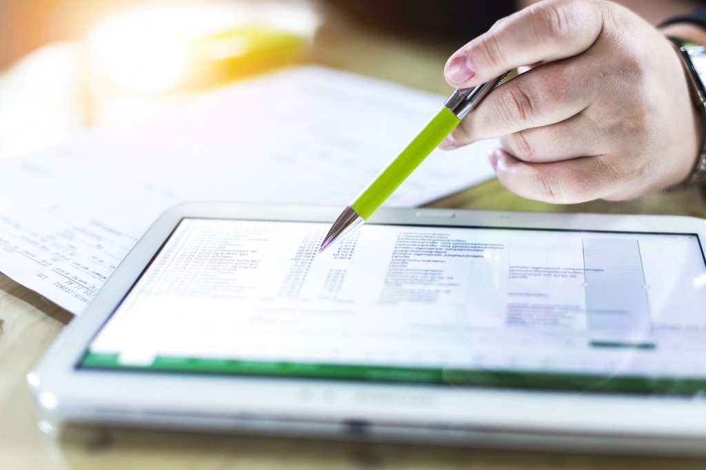 Accounting on a tablet computer, close-up